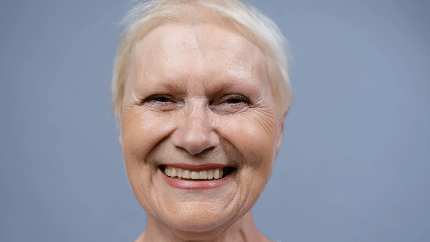 An older woman smiling